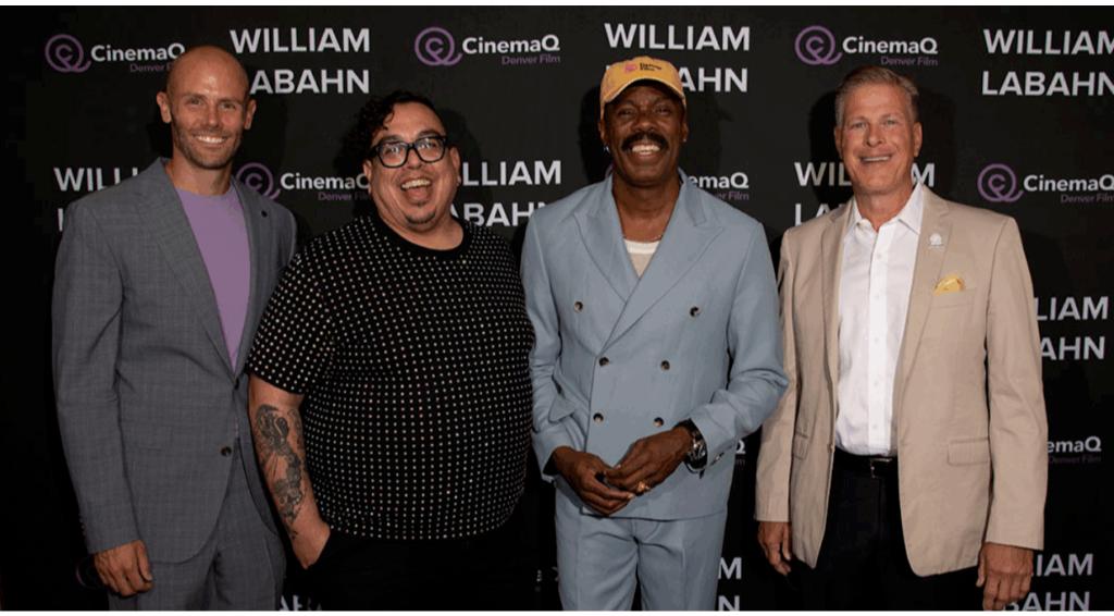 Colman Domingo with three others at CinemaQ event, smiling in front of backdrop with text "William Labahn" and "CinemaQ Denver Film"