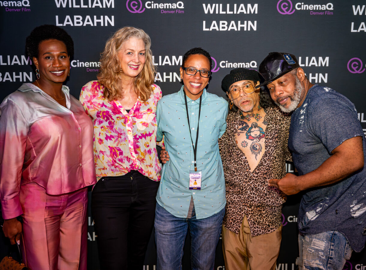 Group of five people standing together at a CinemaQ Denver Film event