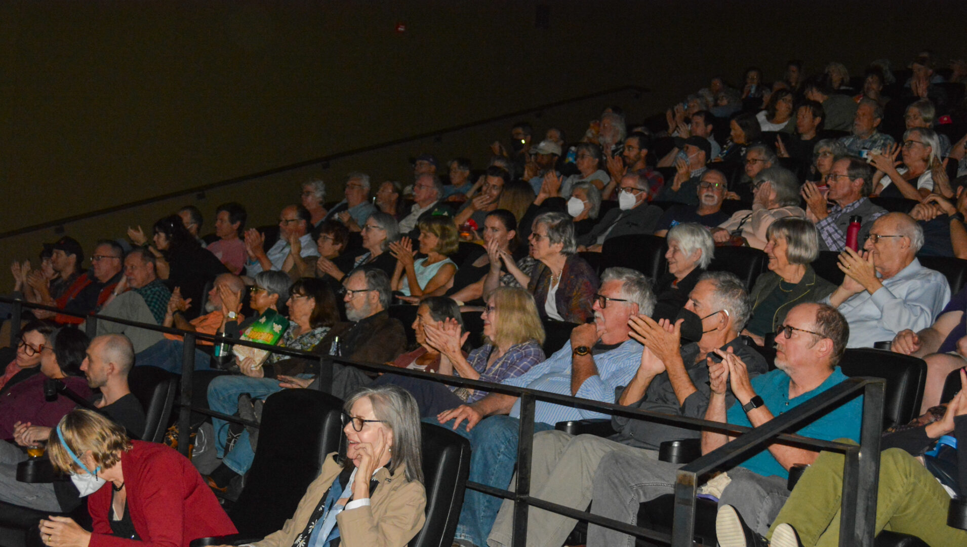 Audience applauding in a theater, DSFF_2023 event, mixed age group