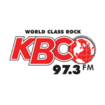 KBCO logo with red letters and a globe design in the letter 'O', text reads "World Class Rock, 97.3 FM"
