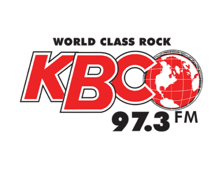 KBCO logo with red letters, globe inside "O," text "World Class Rock 97.3 FM"