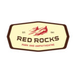 Red Rocks Park and Amphitheatre logo, beige with red text and mountain graphic