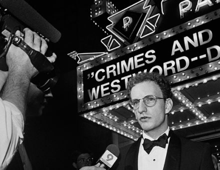 Steven Soderbergh speaks to media, "Crimes and Misdemeanors" marquee in background