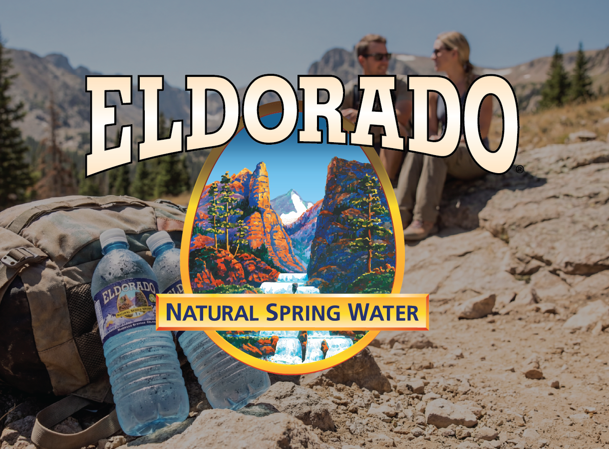 Eldorado Natural Spring Water logo with mountain scene, hikers in background, and two water bottles on a backpack